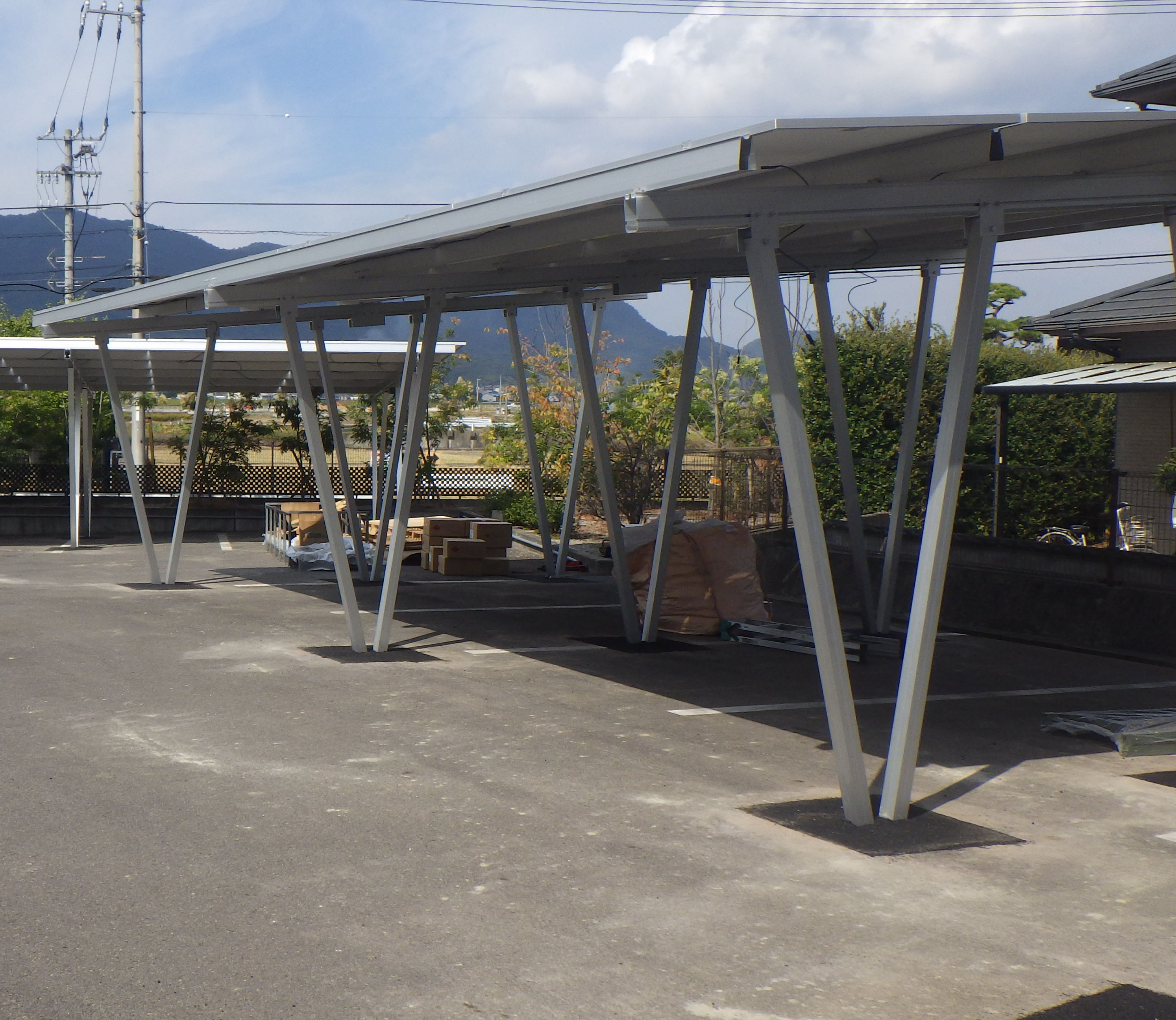 Champagne Fully Waterproof Four Column Residential Aluminium Metal Solar Carport Structure Racking For Car Parking Garages